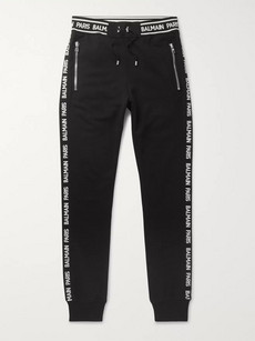 Balmain Slim-fit Tapered Logo-trimmed Loopback Cotton-jersey Sweatpants In Black