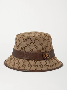 GUCCI LEATHER-TRIMMED MONOGRAMMED CANVAS BUCKET HAT