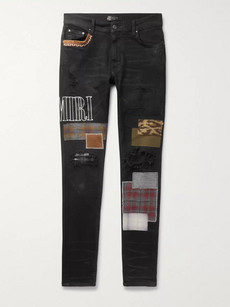 Amiri Skinny-fit Distressed Appliquéd Denim Jeans In Black