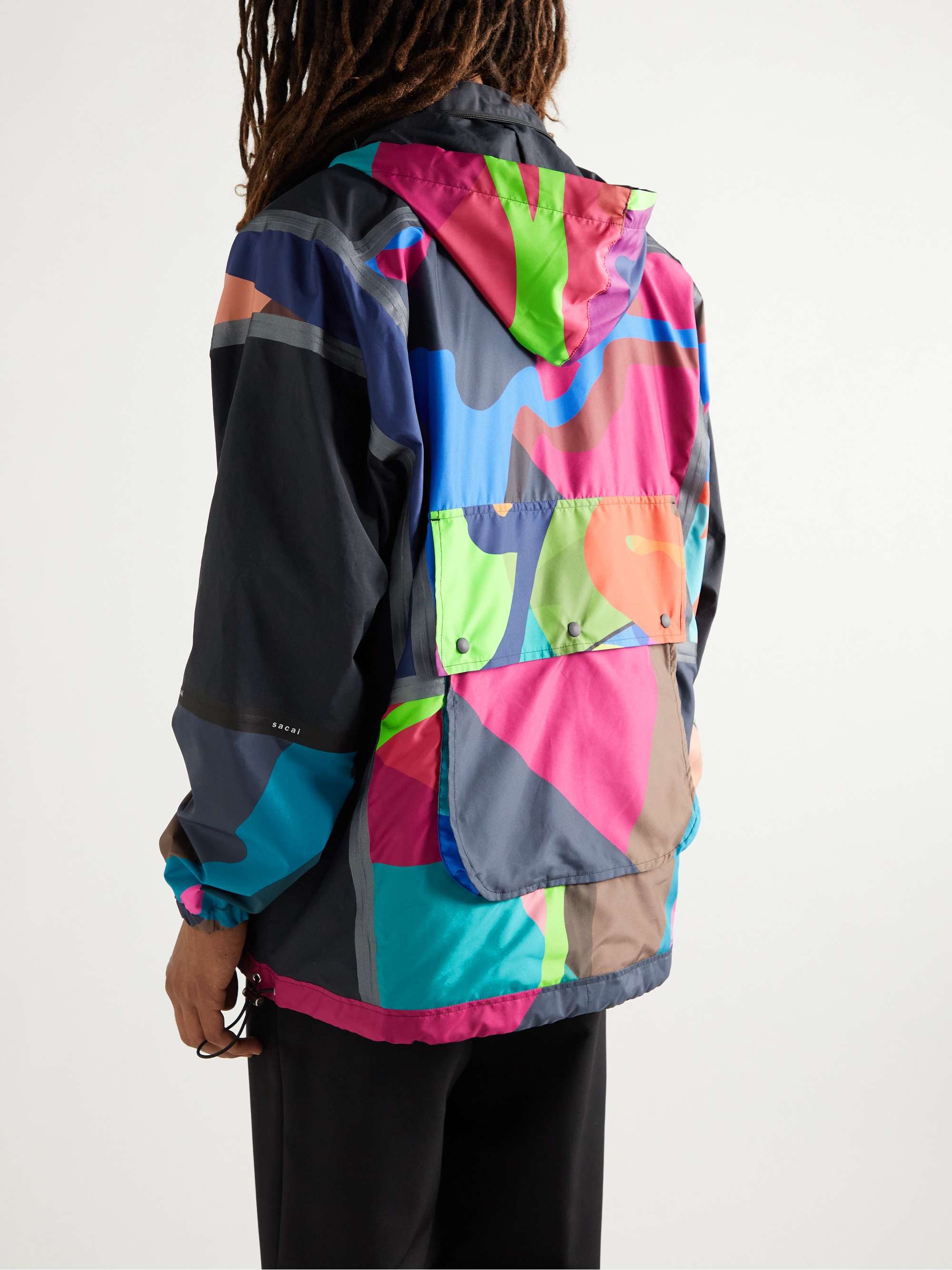 SACAI + KAWS Printed Shell Hooded Jacket