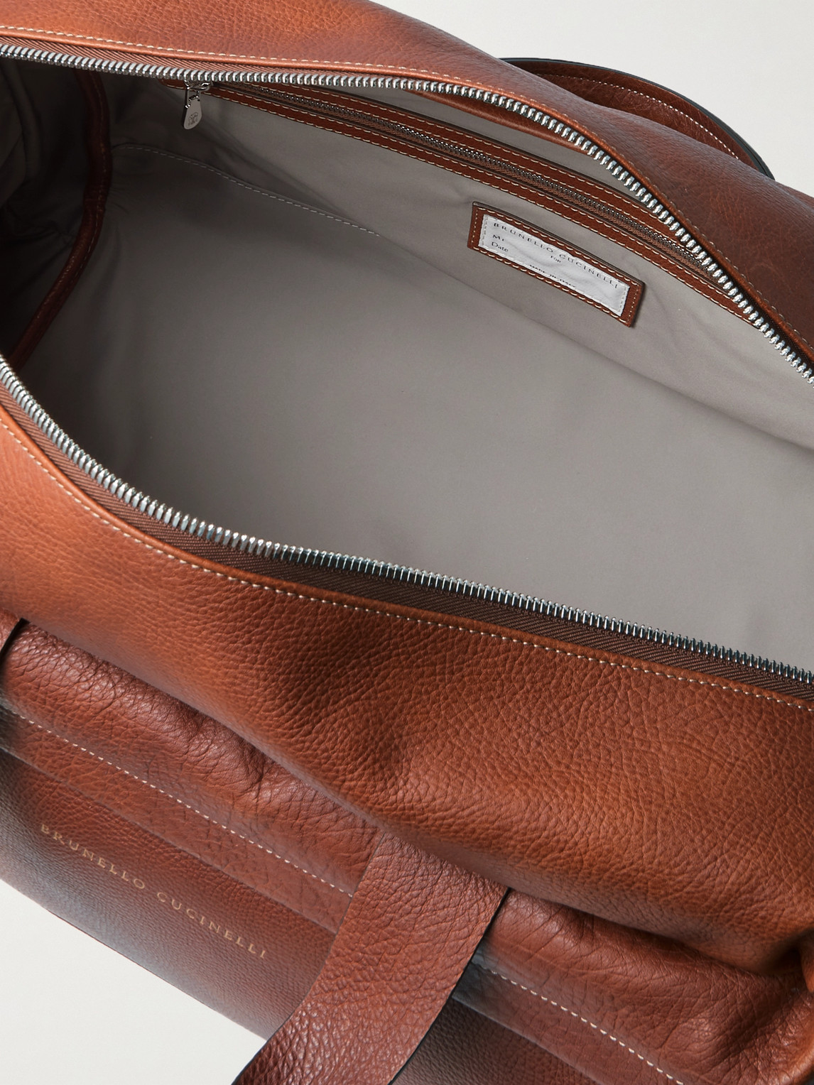 Shop Brunello Cucinelli Logo-print Full-grain Leather Duffle Bag In Brown