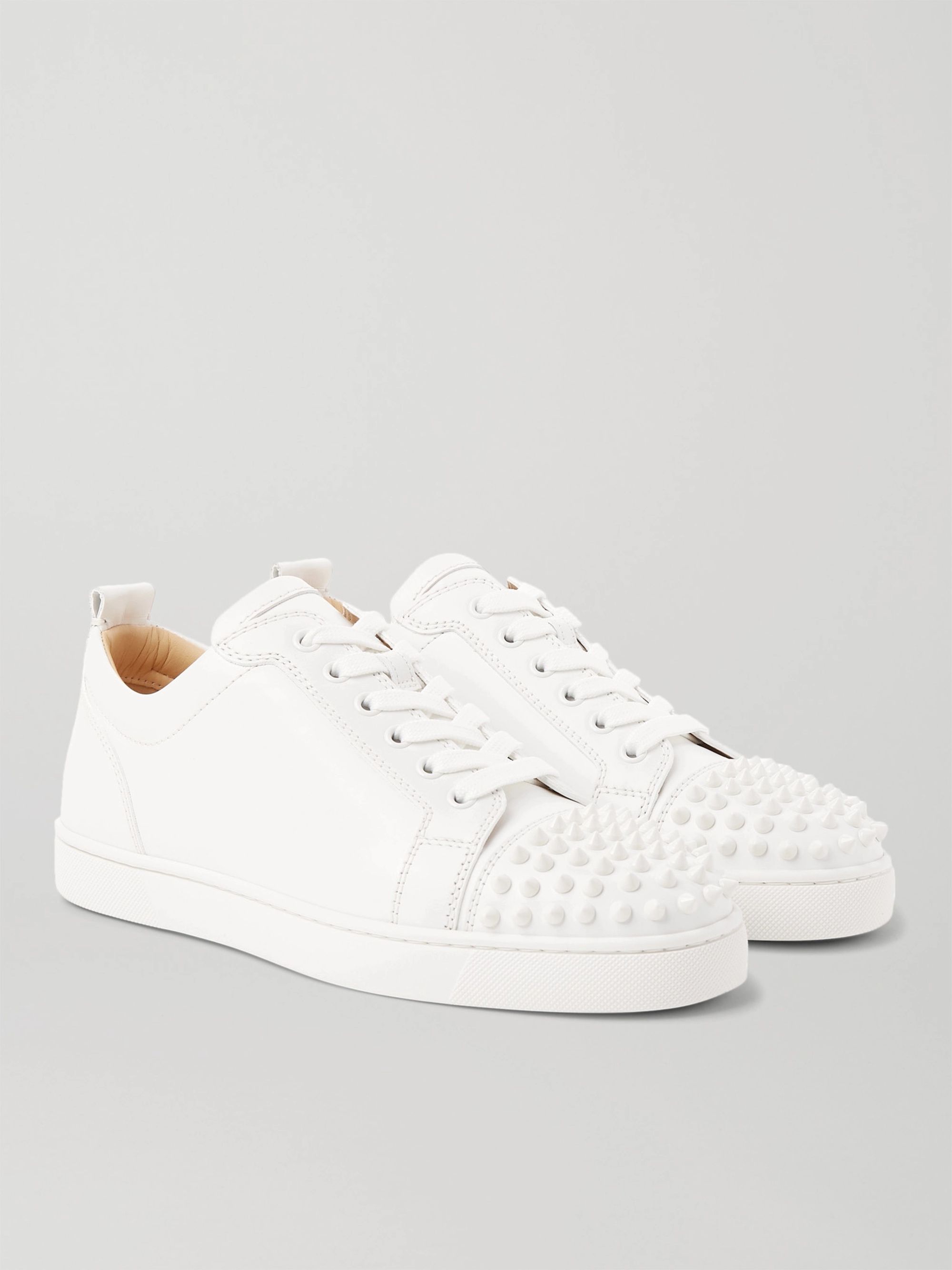 white louboutin spiked sneakers