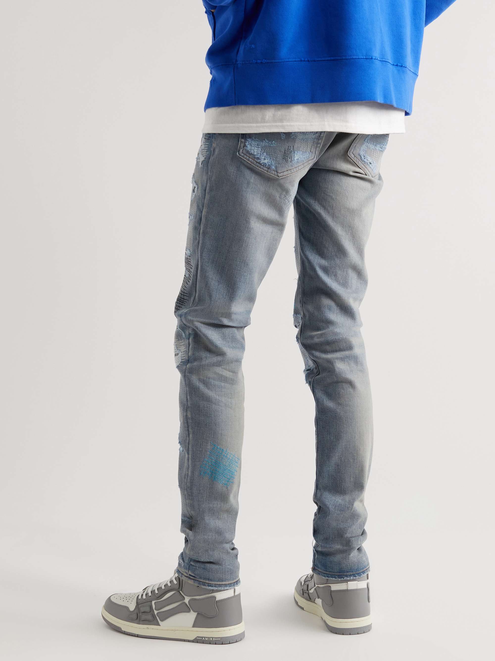 AMIRI Skinny-Fit Distressed Embroidered Jeans