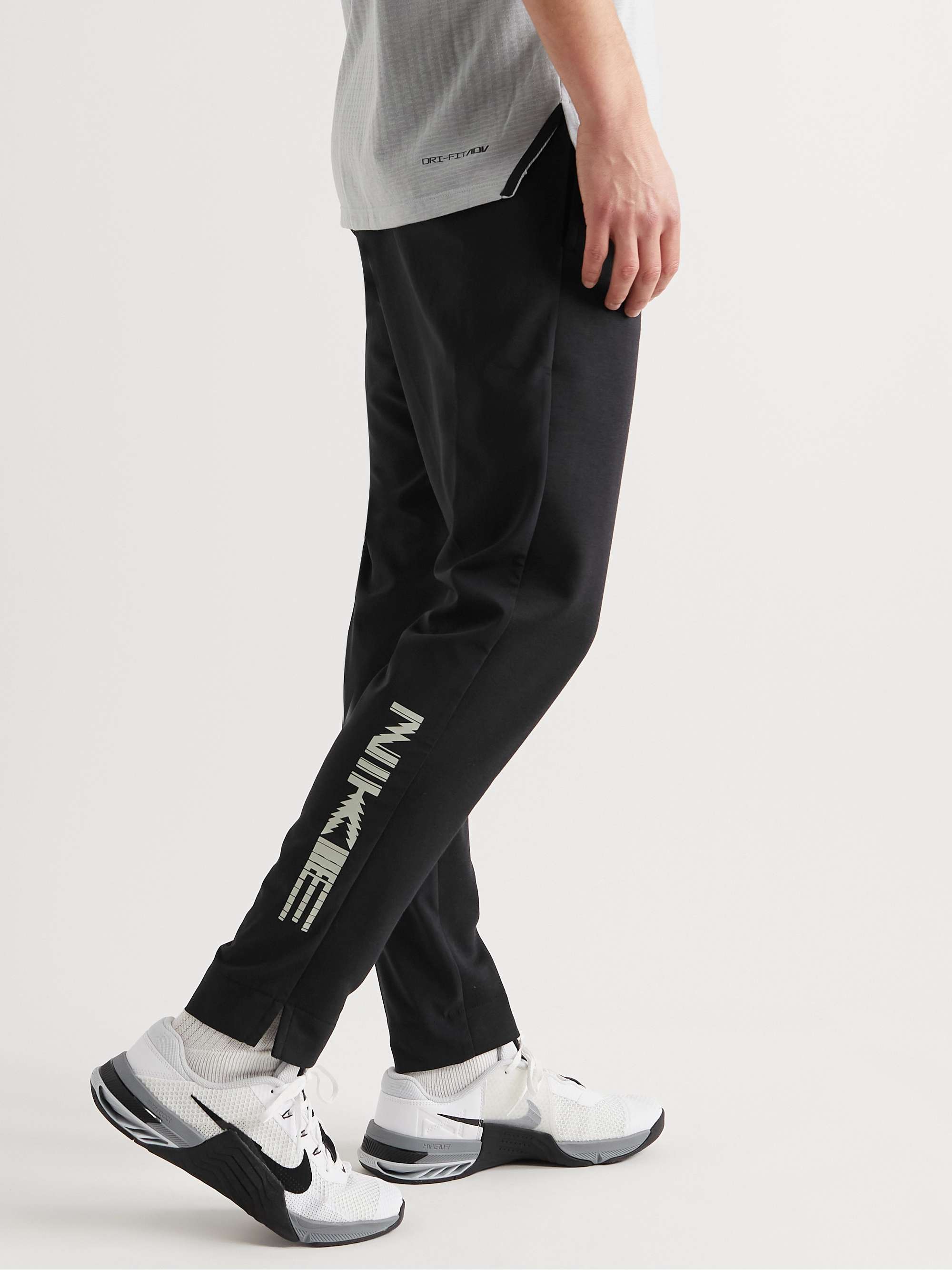 NIKE TRAINING Slim-Fit Tapered Logo-Print Dri-FIT Sweatpants