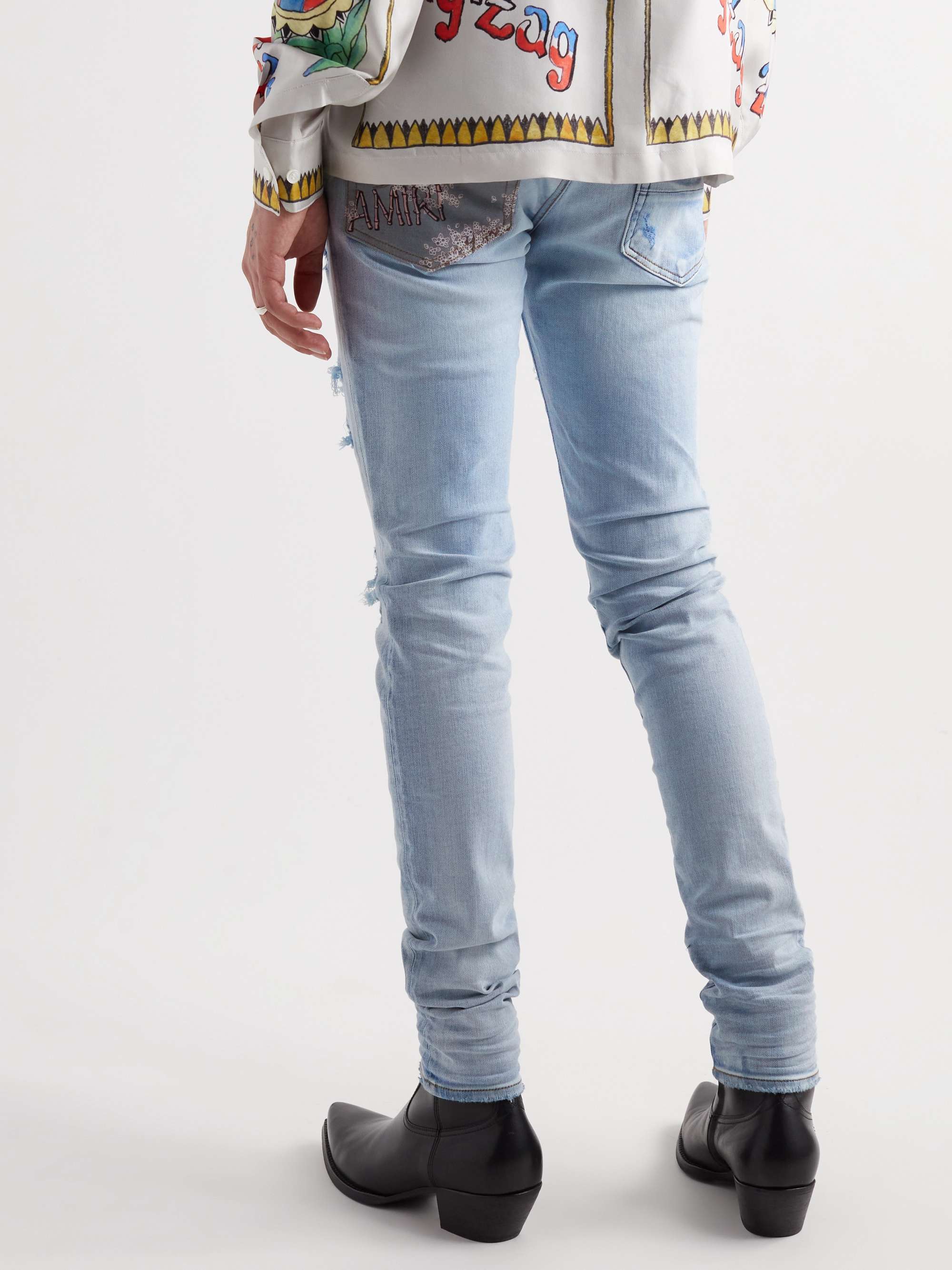 AMIRI Skinny-Fit Panelled Distressed Jeans