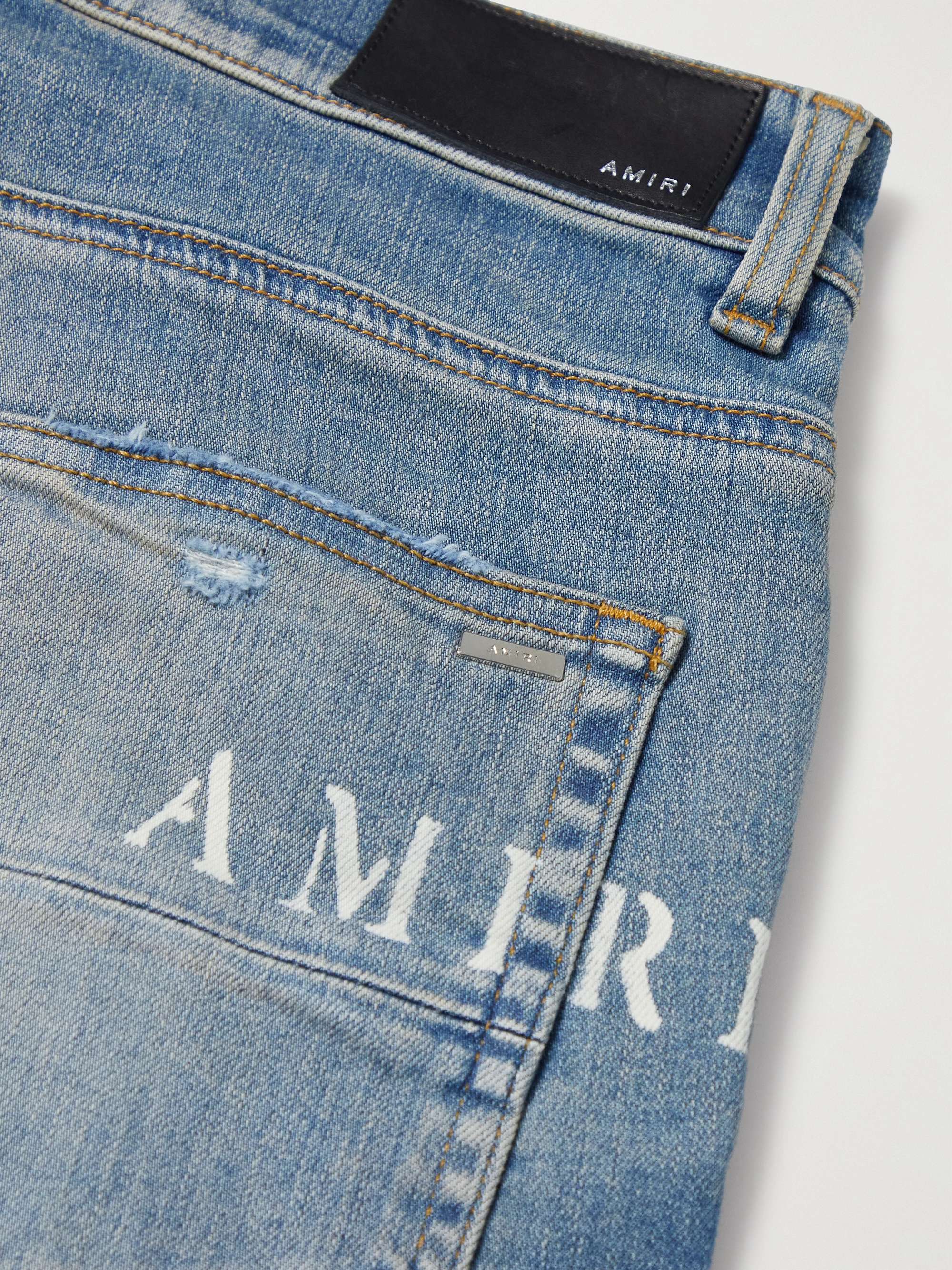 AMIRI Hibiscus Skinny-Fit Distressed Printed Jeans
