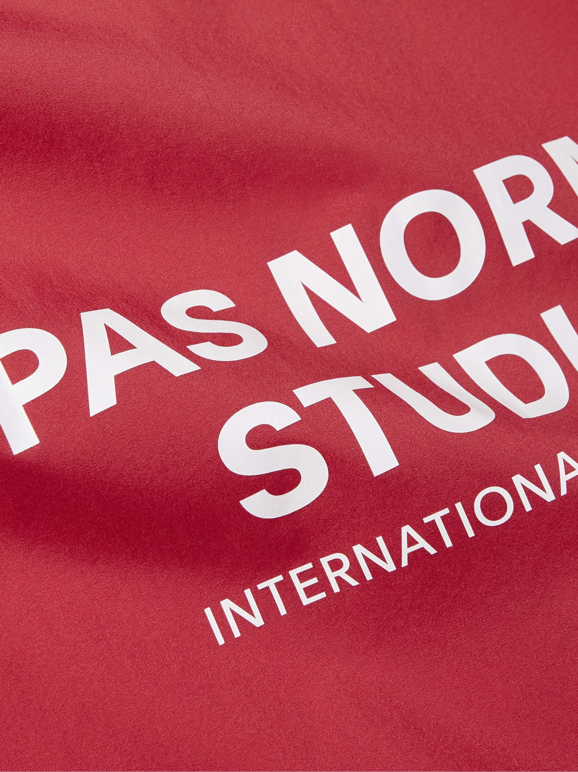 PAS NORMAL STUDIOS Stow Away Logo-Print Nylon Cycling Jacket