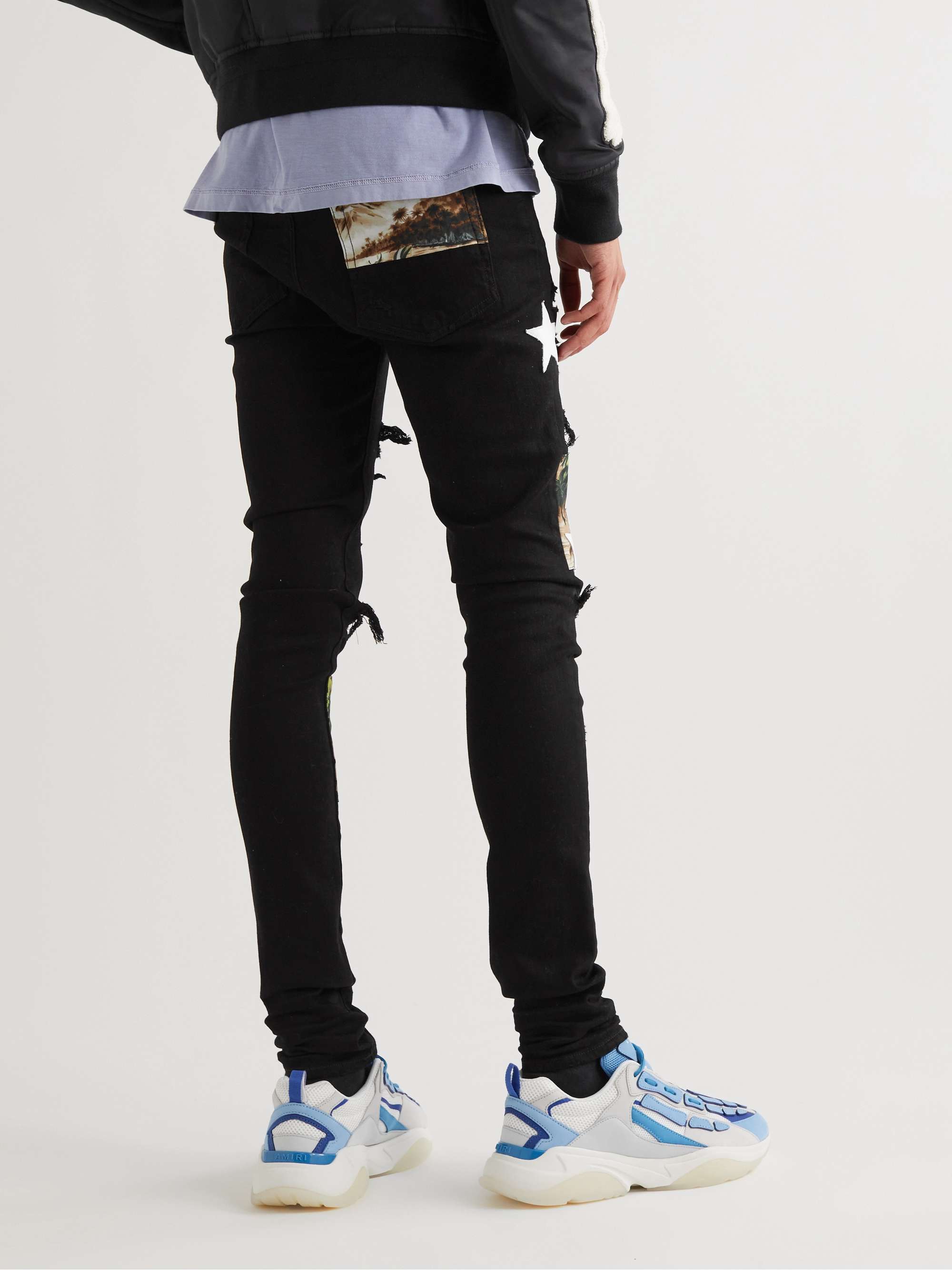 AMIRI Skinny-Fit Leather-Appliquéd Panelled Distressed Jeans