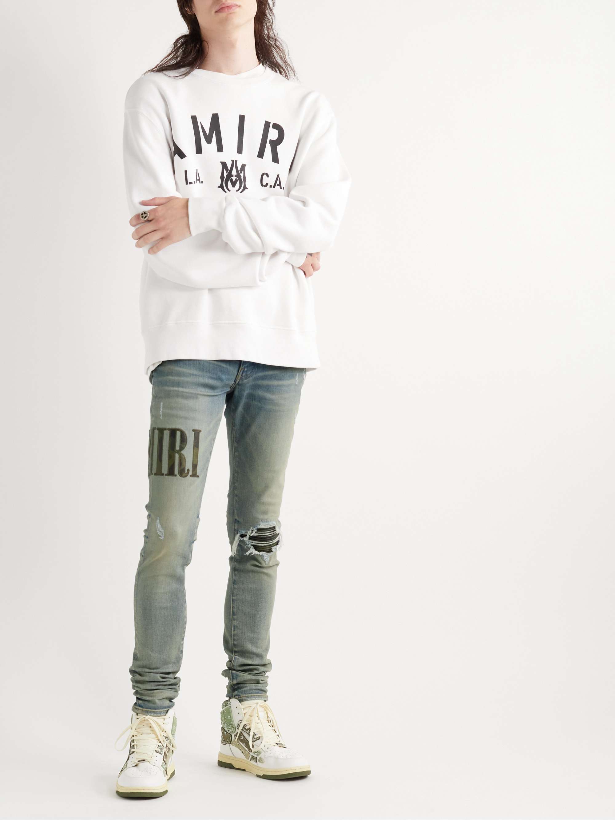 AMIRI Skinny-Fit Leather-Trimmed Distressed Jeans