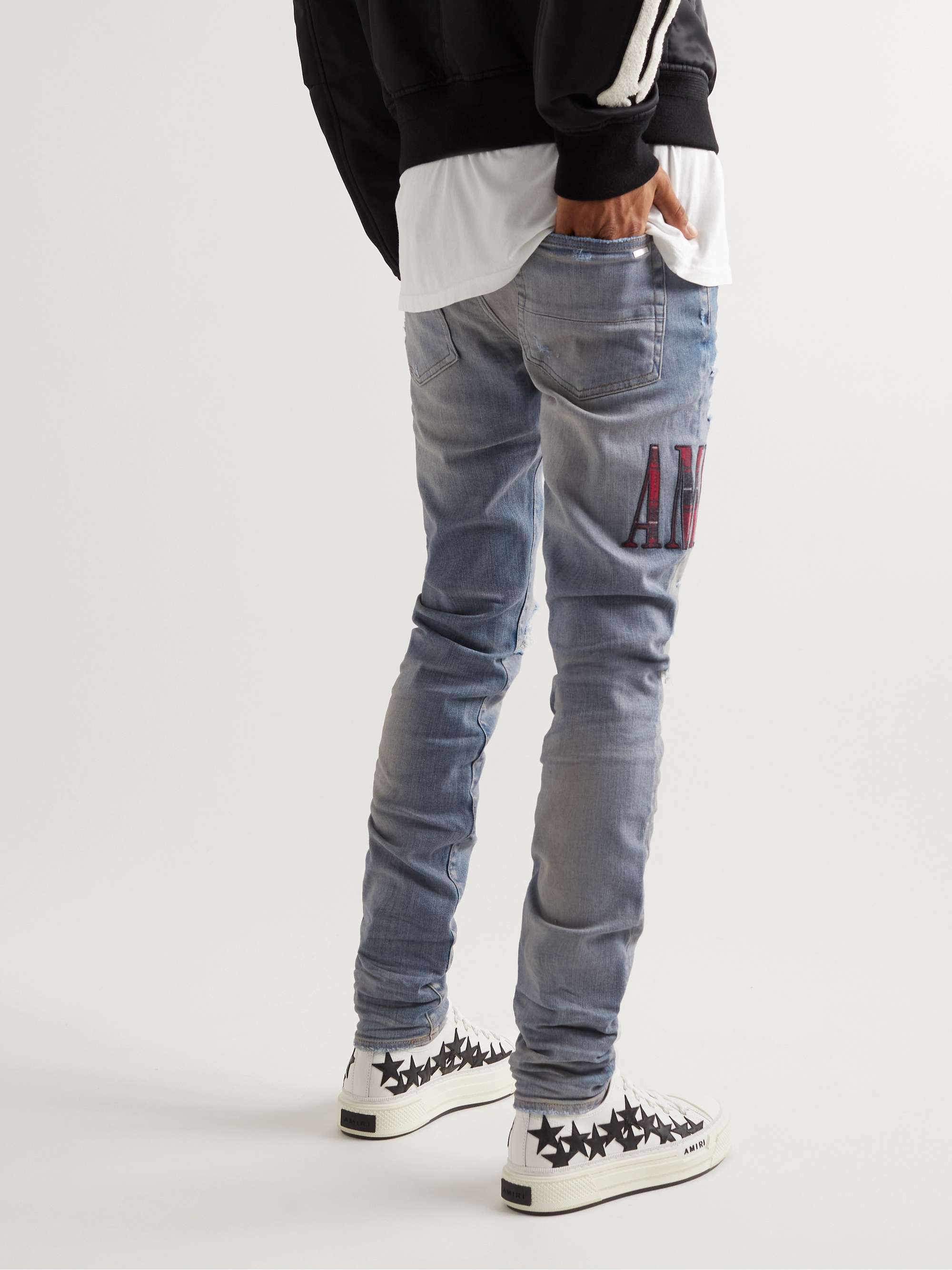 AMIRI Skinny-Fit Appliquéd Distressed Jeans