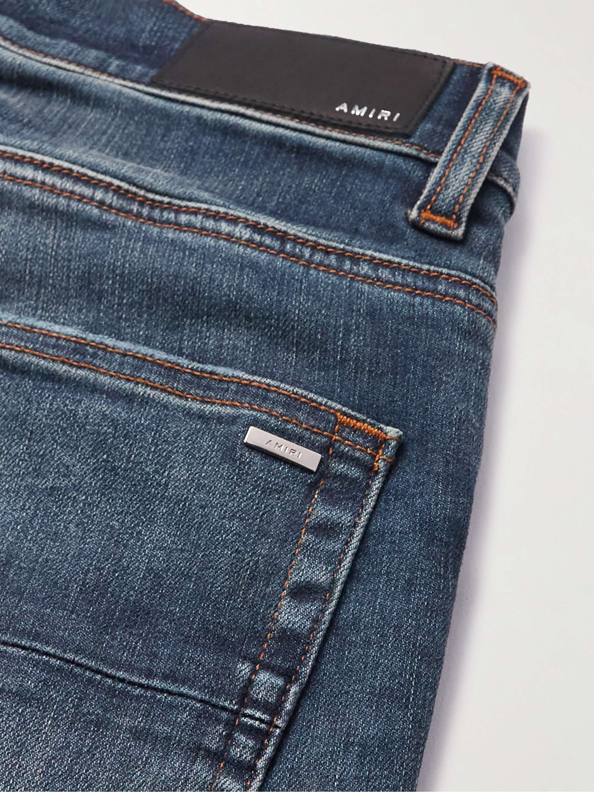 AMIRI Skinny-Fit Leather-Appliquéd Distressed Jeans
