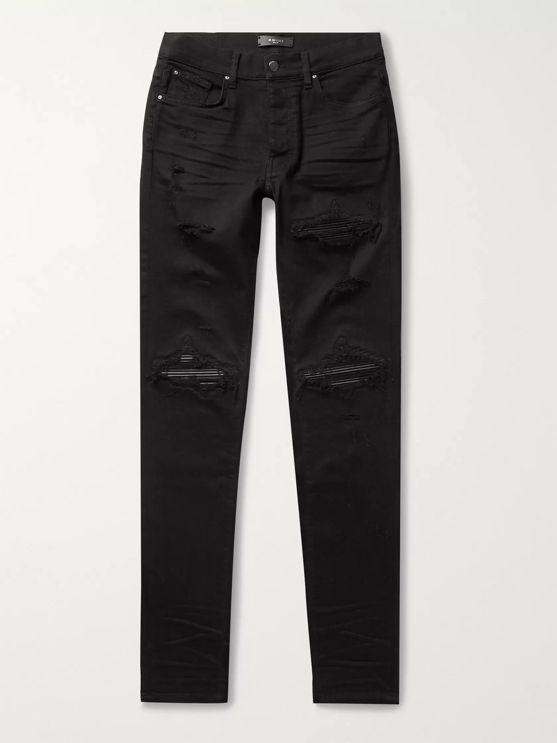 Amiri Mx1 Skinny-fit Distressed Leather-panelled Stretch-denim Jeans In Black