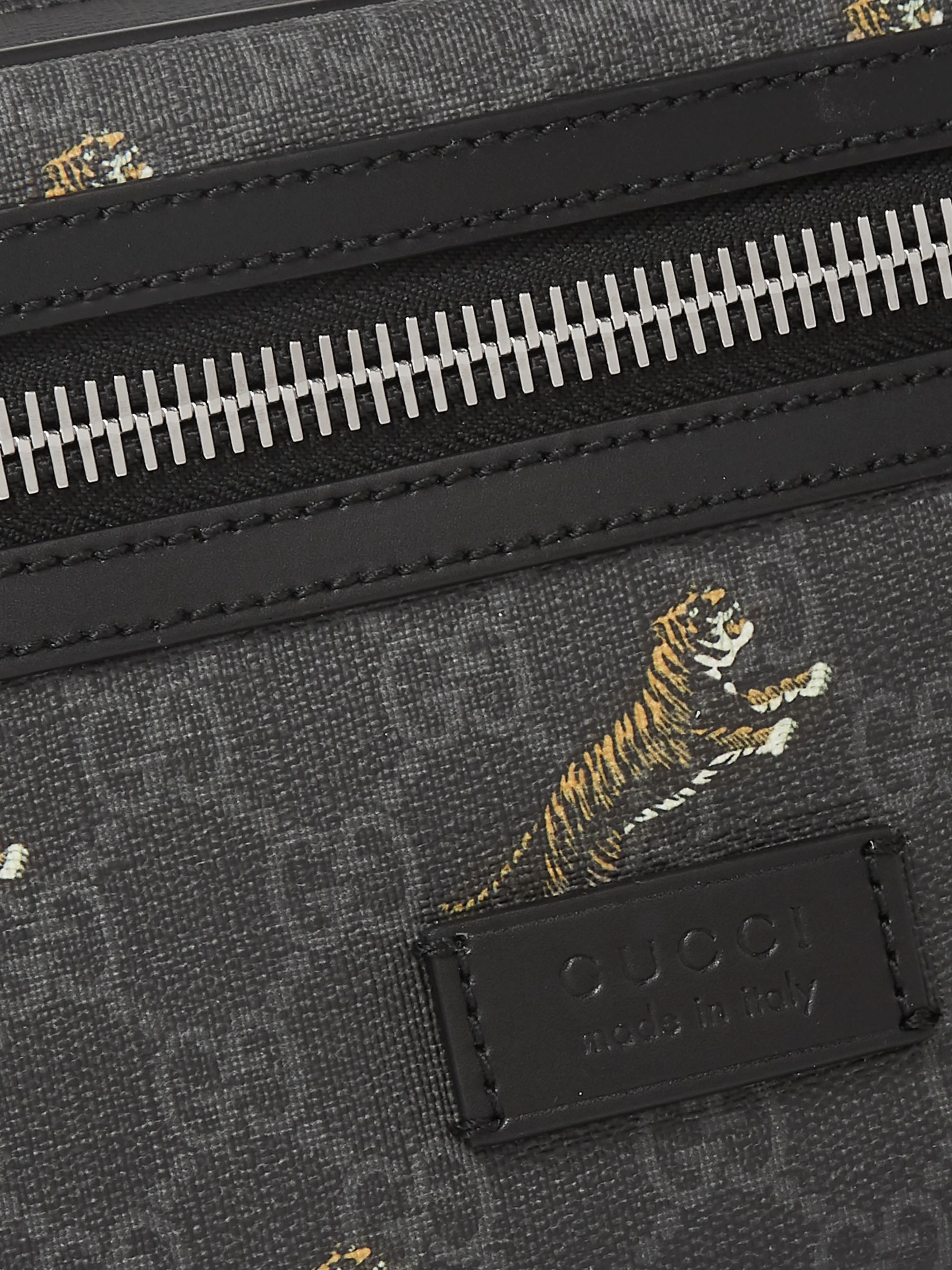Black Leather-Trimmed Monogrammed Coated-Canvas Belt Bag | Gucci | MR PORTER