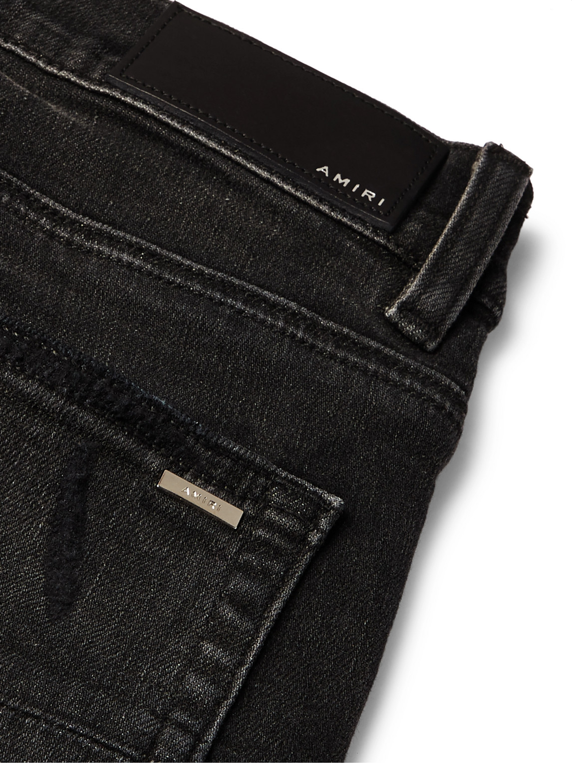 Shop Amiri Mx1 Skinny-fit Panelled Distressed Stretch-denim Jeans In Black