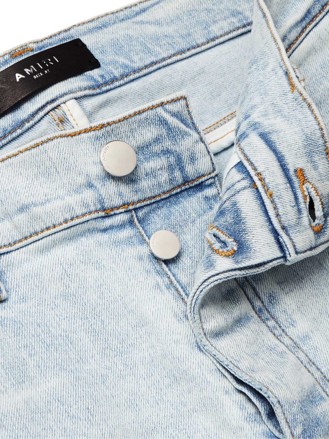 Shop Amiri Thrasher Skinny-fit Appliquéd Distressed Denim Jeans In Blue
